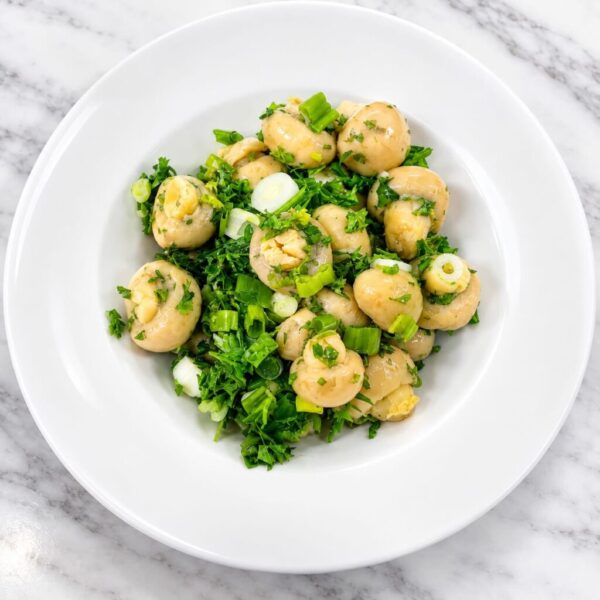 Ukrainian-style pickled mushrooms prepared with garlic, herbs, and sunflower oil at Pierogi Bar St Pete.